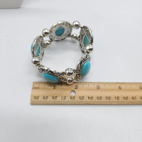 Faux Turquoise Silver Toned Stretch Bracelet With Floral Accents By Erica Lyons - Picture 4 of 5